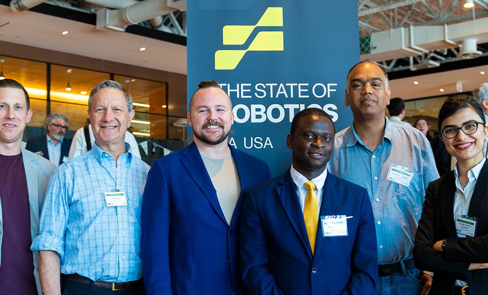 Group photo at the State of Robotics event at Boston Dynamics